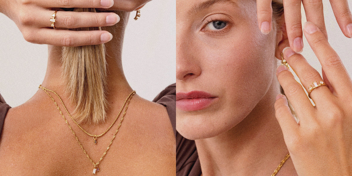 Zwei Models tragen Stilnest Light Play Ringe, Ketten und Ohrringe mit bunten Edelsteinen