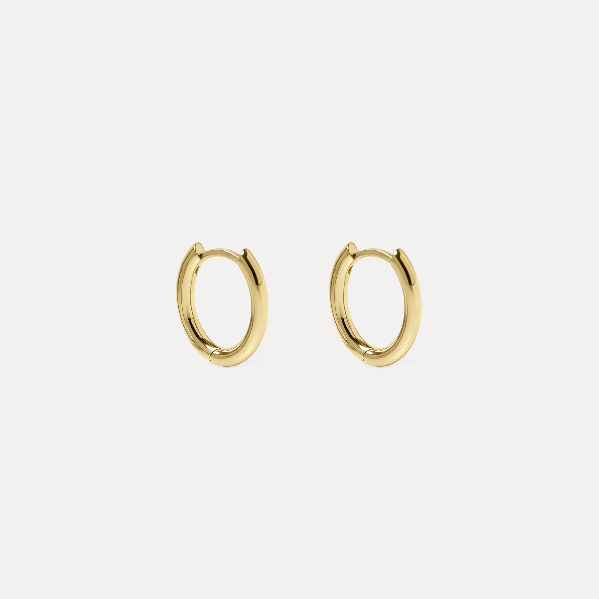 Oval Bold Hinged Huggies | 585 Gold