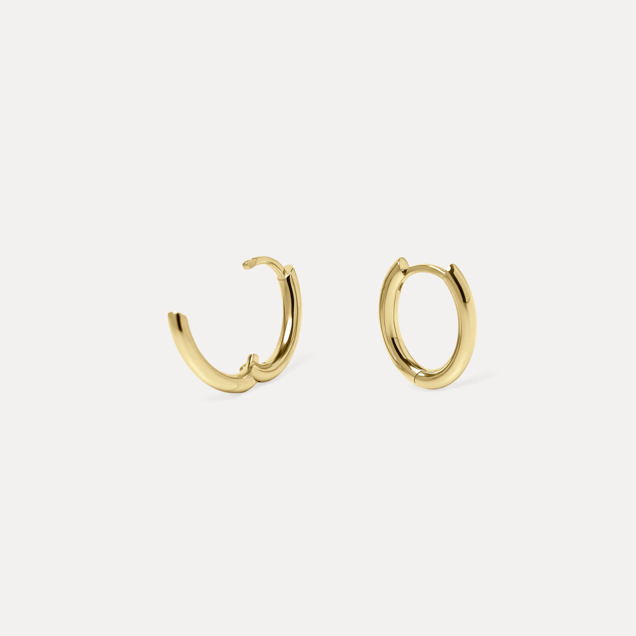 Oval Bold Hinged Huggies | 585 Gold