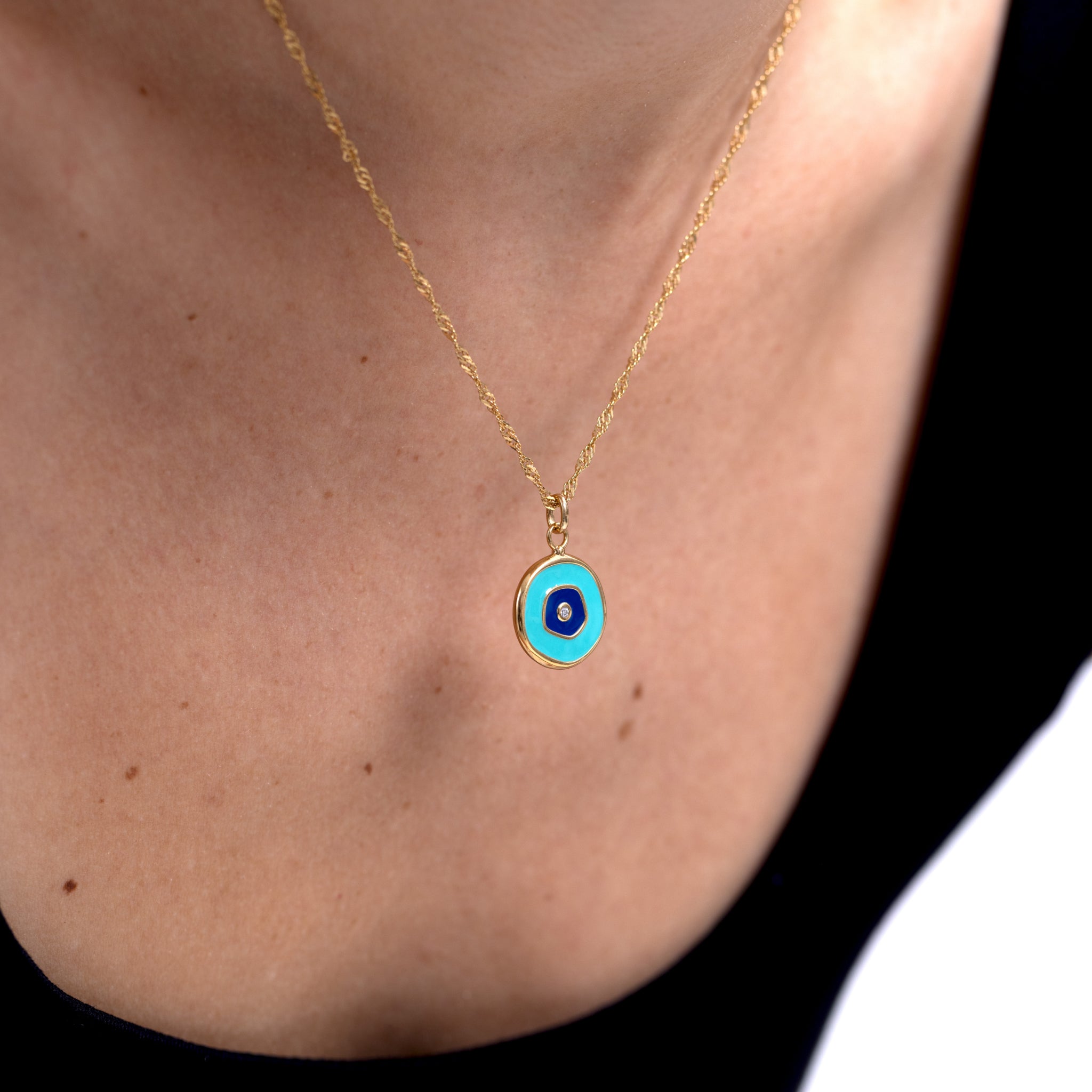 Weißer Saphir Evil Eye Anhänger Türkis